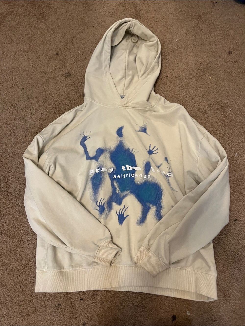 Aelfric Eden Cream Hoodie with Blue Spray Graphic - Unisex Sweater